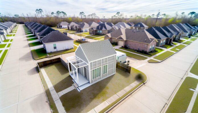 High-resolution realistic photograph of a 3D-printed home in Houston’s first 3D-printed home community, photographed in a real environment, matching the look of existing press images about the same. Avoid futuristic or stylized elements.