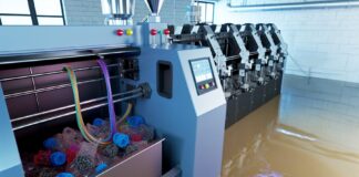 Turn Your Failed 3D Prints into New Filament with ExtrudeX High-resolution realistic photograph of ExtrudeX recycling failed 3D prints into filament, photographed in a real workshop or makerspace environment, matching the look of existing press images about the same product. Avoid futuristic or stylized elements.