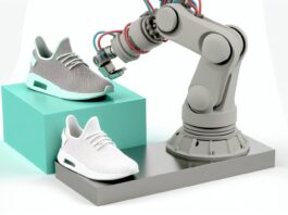 High-resolution realistic photograph of a 3D-printed sneaker and robotic arm produced by IN3D, photographed in a real environment, matching the look of existing press images about the same. Avoid futuristic or stylized elements.