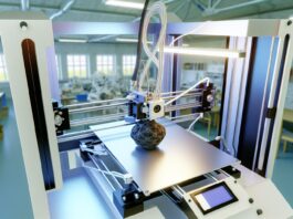 High-resolution realistic photograph of a 3D printer in action, creating a complex object in a real-world setting, such as a workshop or laboratory. Avoid futuristic or stylized elements.